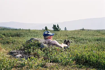 Taking a break in the tundra hiking tour in the Yukon