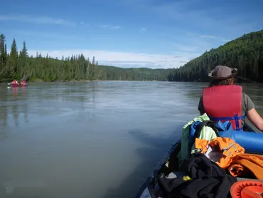 Paddling a loaded canoe paddle canoe, guided canoe tours